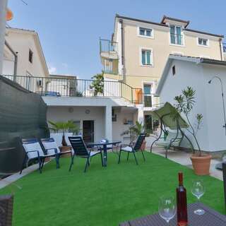 Апартаменты Solar Apartments Херцег-Нови Номер-студио с видом на сад-3